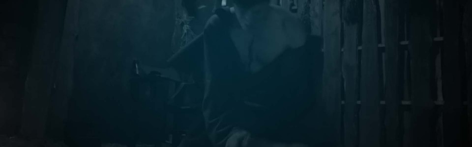 Still of a man kneeling and crying in a disheveled room in TV movie Dark Haul. Flavorlab Score's Erik Blicker wrote original music for the thriller.