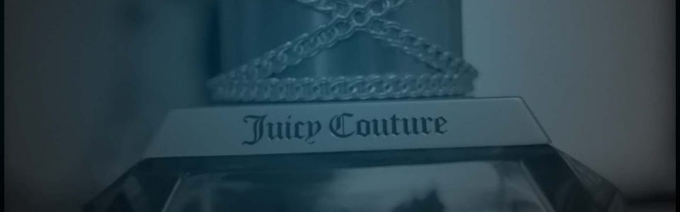 Still of Juicy Couture perfume commercials. Producer's Toolbox provided music clearance services for the spot.