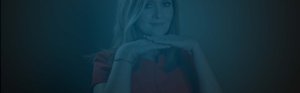 Still of Samantha Bee with her hands crossed beneath her chin. Flavorlab Score provided custom original music for the show.