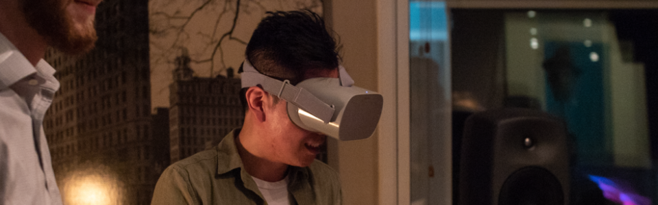 JC Chao wearing a VR headset at the Flavorlab 360 showcase with Gramercy Tech