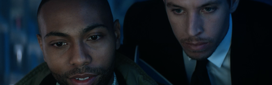 Still of Beau Knapp & Jeremie Harris staring at a computer screen in 2019 film Crypto. Flavorlab Sound provided complete audio post production - sound design, voice over recording, and mix to the feature.