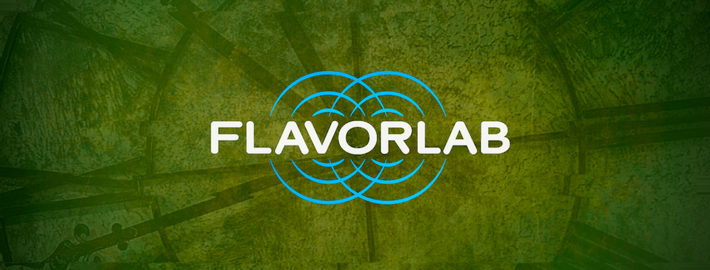 Banner for the 2021 March Tastes playlist - the Flavorlab logo overlaid on a distorted, green picture of a wrought iron clock.